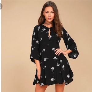 NWOT. Others Follow Black Floral Print Dress.